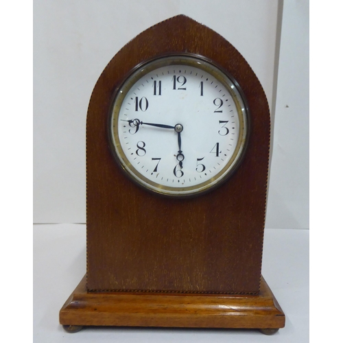 137 - An Edwardian mahogany cased mantel timepiece; the movement faced by an Arabic dial  9