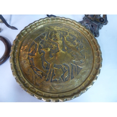 139 - Metalware: to include an early 19thC brass trivet, raised on splayed feet  8