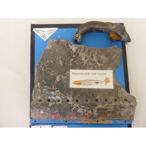 153 - Framed fragment pieces, believed to be from a circa 1940 Messerschmitt BF 109E-7 aircraft(Please Not... 