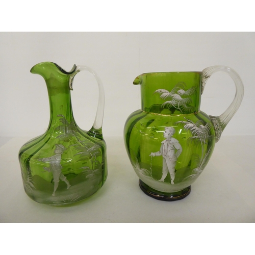 163 - A mixed lot: to include two Mary Gregory style, clear and green glass jugs