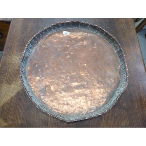 167 - A rustically made Indian copper tray with a crimped border  21.5