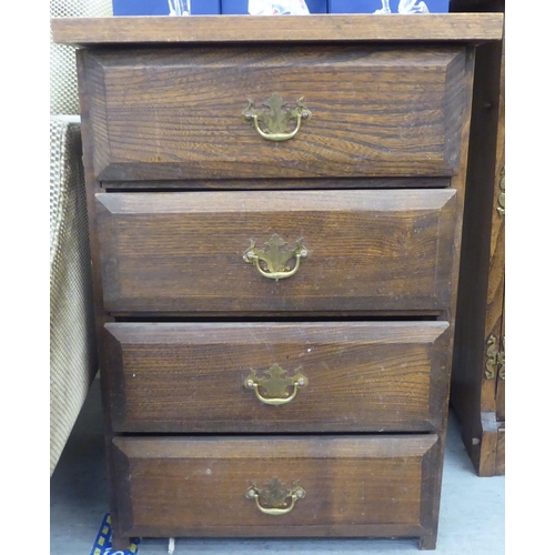 197 - A modern traditional style oak four drawer pedestal chest, on block ends  30