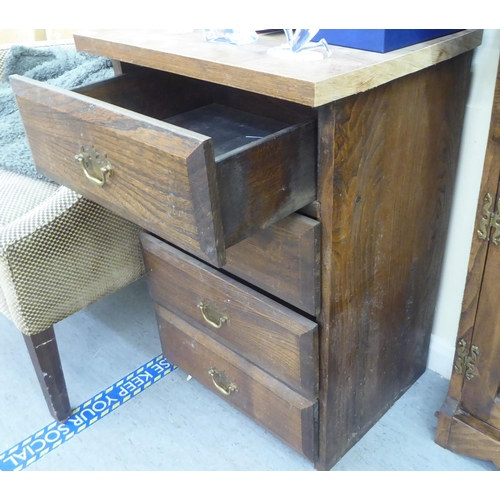 197 - A modern traditional style oak four drawer pedestal chest, on block ends  30