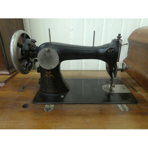 198 - A vintage Simanco sewing machine, set in a cast iron treadle frame  29