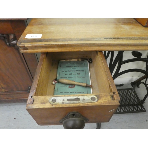 198 - A vintage Simanco sewing machine, set in a cast iron treadle frame  29