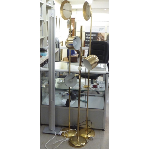 206 - Four modern standard lamps, various styles: to include a modern bar lamp  67