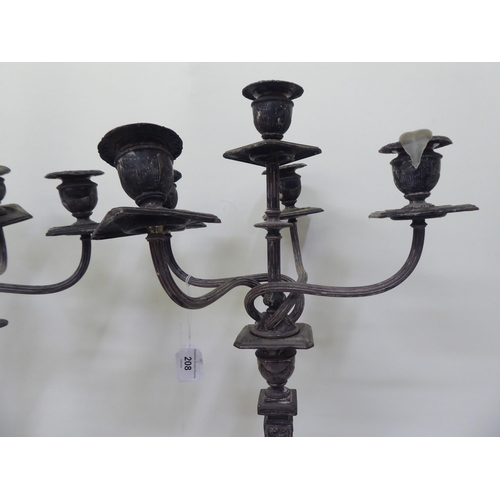 208 - A pair of early 20thC silver plated, five branch candelabra, each on a pedestal base  19