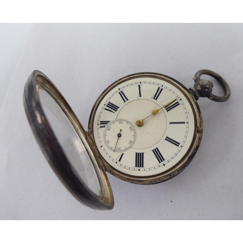 22 - Items of personal ornament: to include a gold plated half hunter pocket watch, faced by a Roman dial... 