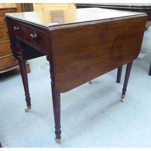 226 - A mid 19thC mahogany Pembroke table, the top with round corners, an end drawer and facsimile on the ... 