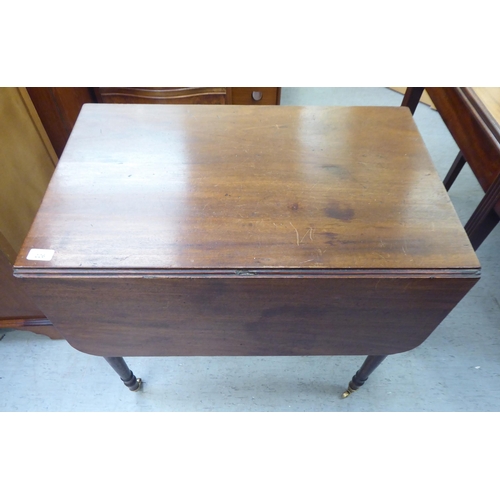 226 - A mid 19thC mahogany Pembroke table, the top with round corners, an end drawer and facsimile on the ... 