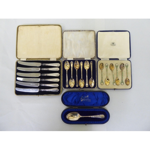 228 - Cased silver presentation spoons: to include a set of six gilded and coloured enamelled coffee spoon... 