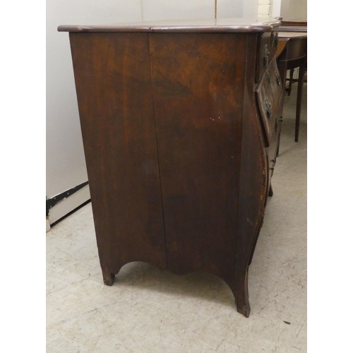 251 - A late 19thC Continental oak, four drawer, bombe front chest, raised on splayed forelegs  31