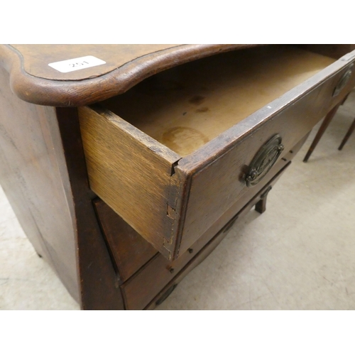 251 - A late 19thC Continental oak, four drawer, bombe front chest, raised on splayed forelegs  31