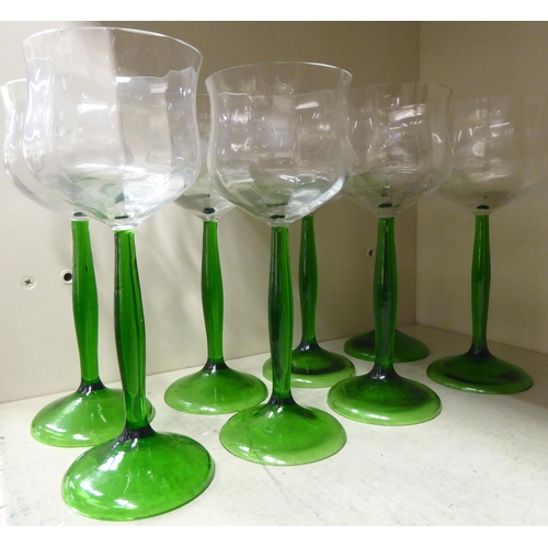 258 - A set of eight Art Nouveau green and clear glass wines