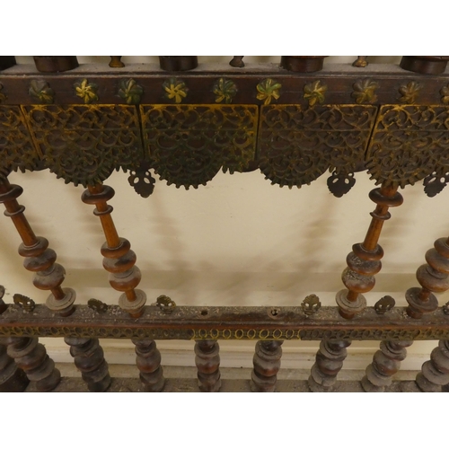 282 - A late 19thC Anglo-Indian carved hardwood and overlaid metal, single bedhead  41