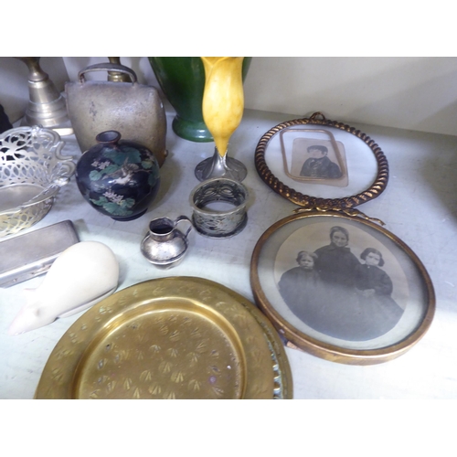 304 - A mixed lot: to include a pair of brass candlesticks  8