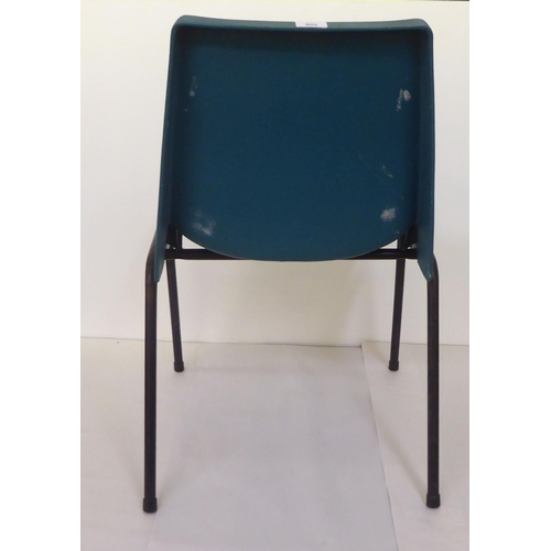 306 - Three Morris of Glasgow moulded plastic stacking chairs, raised on metal legs 