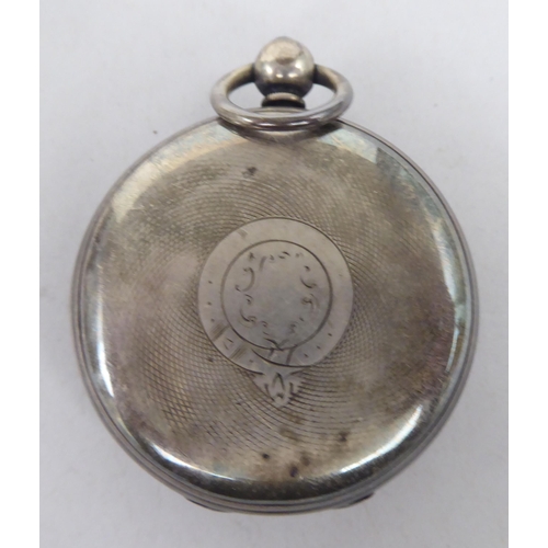 55 - A silver cased pocket watch, faced by an engine turned, silvered and gilded Roman dial, incorporatin... 