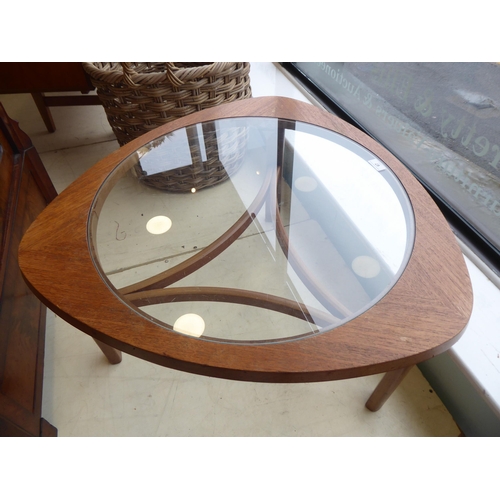 67 - A 1970s teak framed coffee table with a glass insert, raised on a bentwood underframe  17