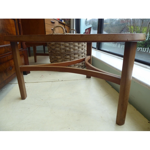 67 - A 1970s teak framed coffee table with a glass insert, raised on a bentwood underframe  17