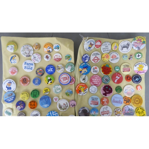 78 - A collection of printed badges: to include 'Dennis the Menace Fan Club' and 'London Transport' relat... 