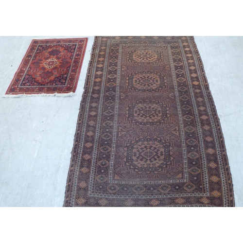 89 - Three small rugs: to include a Persian example, on a multi-coloured ground  47