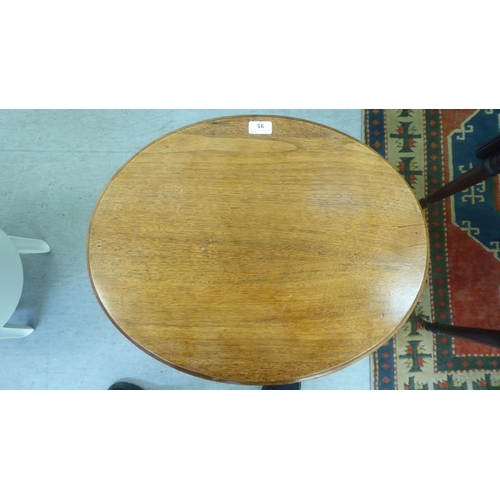 95 - A late Victorian walnut and mahogany occasional table with a shallow frieze drawer, raised on splaye... 