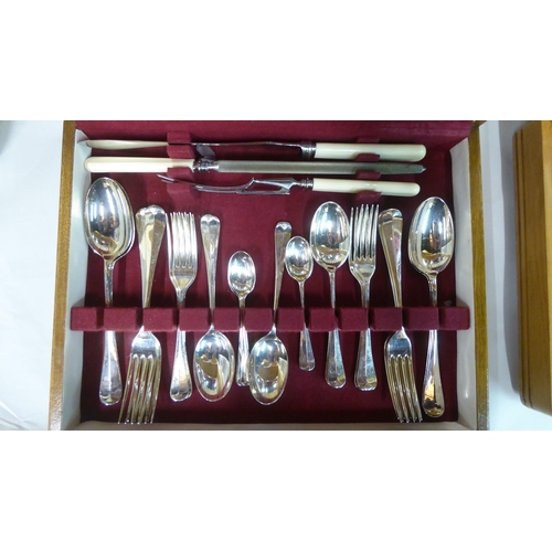 99 - Metalware: to include a late Victorian silver plated tray with opposing handles and a cast fruiting ... 