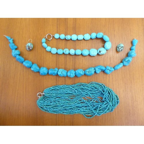 110 - Three turquoise necklaces of various designs; and a pair of turquoise earrings