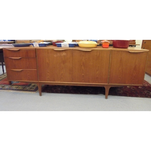 189 - A 1970s McIntosh teak draw leaf dining table, raised on round, tapered legs  29