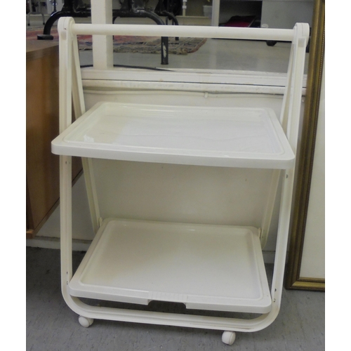 245 - A modern Simo white plastic folding, two tier serving trolley, on casters  22