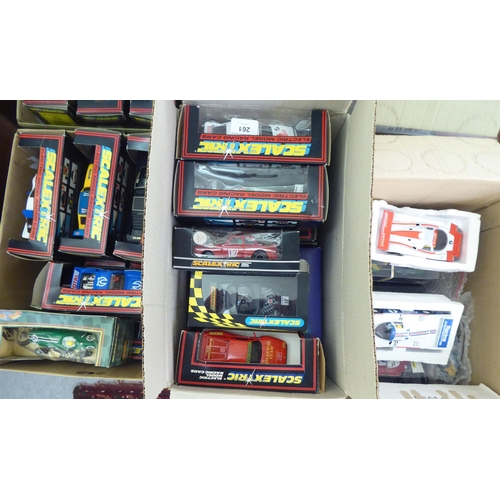 261 - A collection of Scalextric electric model vehicles: to include F1 and Rally examples  mianly bo... 