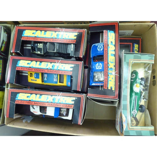 261 - A collection of Scalextric electric model vehicles: to include F1 and Rally examples  mianly bo... 