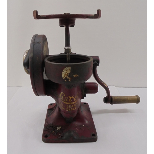 130 - A vintage Lister Ball bearing cream separator cast iron machine with original operating instructions... 