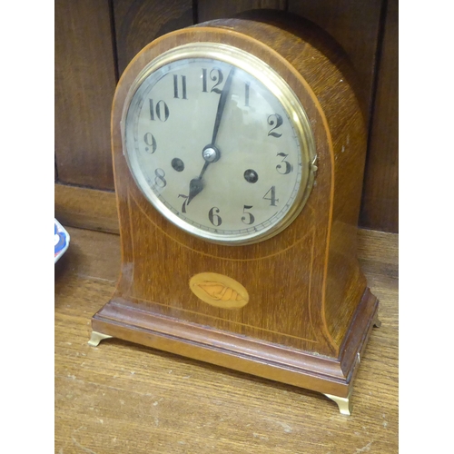 147 - Mainly early/mid 20thC clocks and mantel timepieces: to include a 1940s Napoleon's hat design, mahog... 