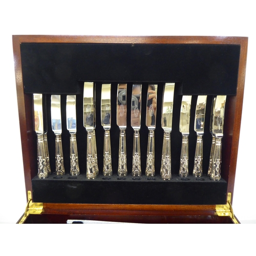 158 - A canteen of stainless steel Kings pattern cutlery and flatware, contained in a tray fitted table-to... 