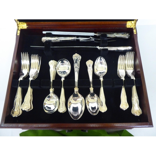 158 - A canteen of stainless steel Kings pattern cutlery and flatware, contained in a tray fitted table-to... 