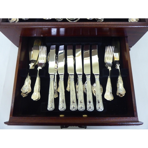 158 - A canteen of stainless steel Kings pattern cutlery and flatware, contained in a tray fitted table-to... 