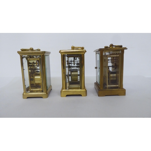 161 - Three lacquered brass carriage timepieces, each faced by a Roman dial  4.5