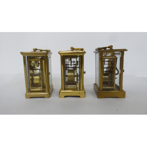 161 - Three lacquered brass carriage timepieces, each faced by a Roman dial  4.5