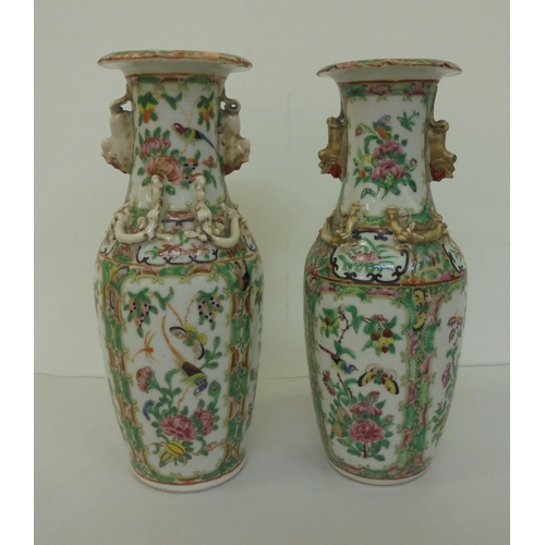 164 - Two similar Chinese Canton Export porcelain vases with overlaid ornament, decorated in panels with s... 