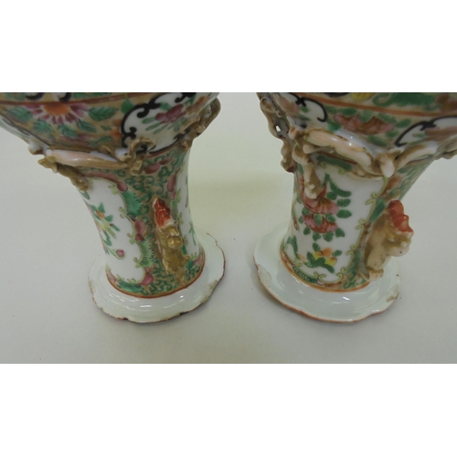 164 - Two similar Chinese Canton Export porcelain vases with overlaid ornament, decorated in panels with s... 