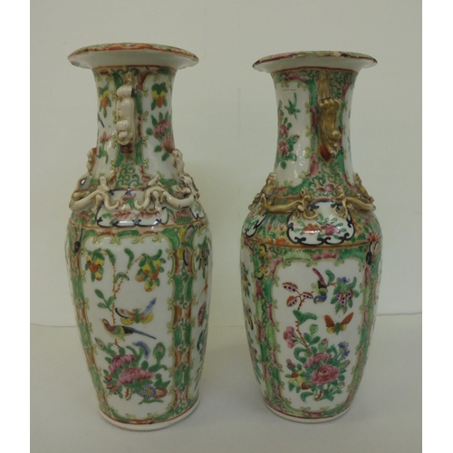 164 - Two similar Chinese Canton Export porcelain vases with overlaid ornament, decorated in panels with s... 