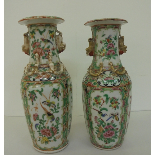 164 - Two similar Chinese Canton Export porcelain vases with overlaid ornament, decorated in panels with s... 