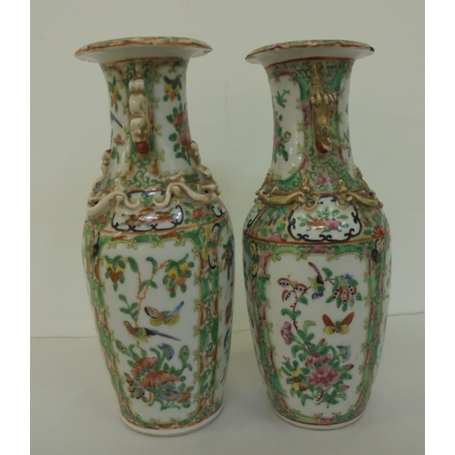 164 - Two similar Chinese Canton Export porcelain vases with overlaid ornament, decorated in panels with s... 