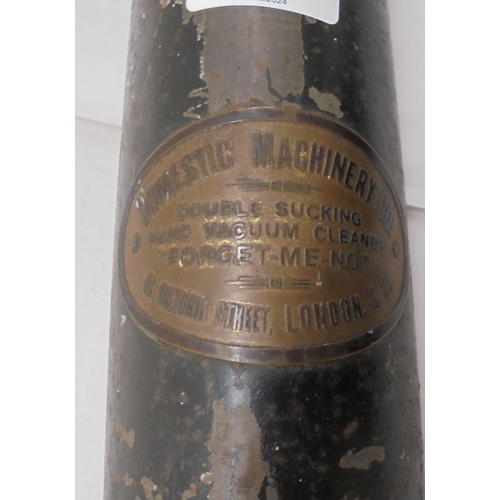 8 - An early 20thC Domestic Machinery Company cast metal hand vacuum