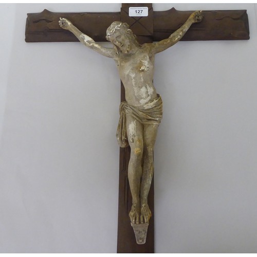 127 - A carved wooded and moulded plaster crucifix, the Corpus Christie  35