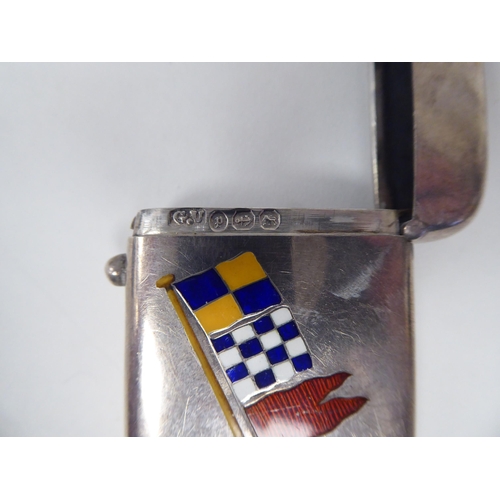 116 - A late Victorian silver and coloured enamel vesta case of rectangular design, incorporating four fla... 