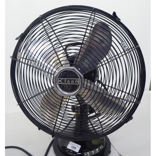 106 - A National Winder Cinni black enamelled finished electric table fan