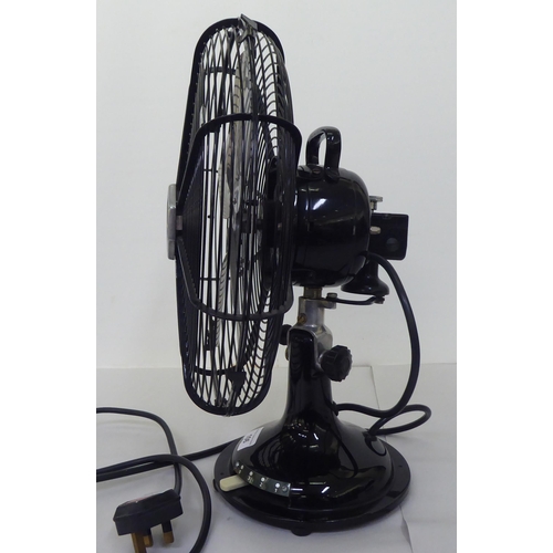 106 - A National Winder Cinni black enamelled finished electric table fan